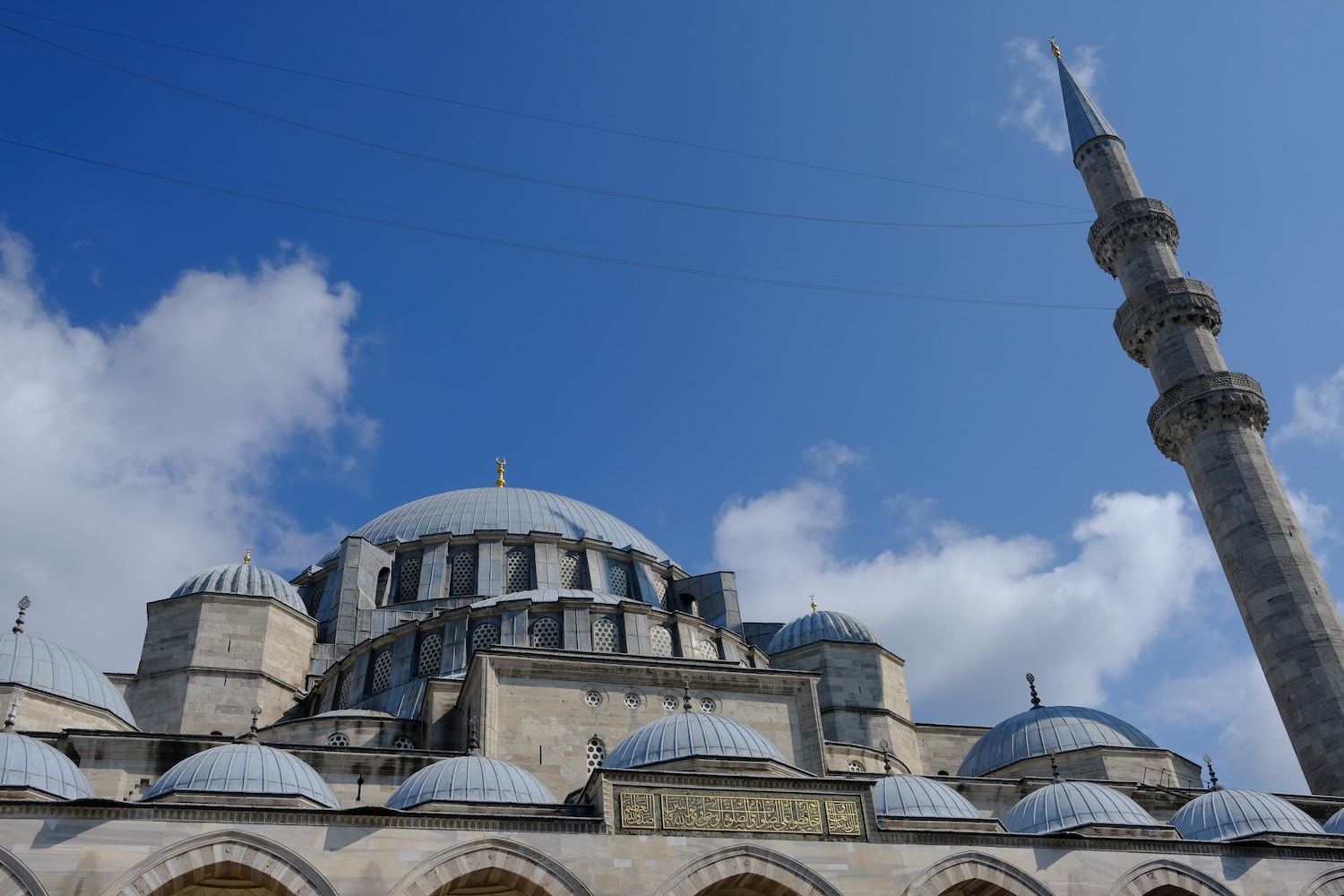 The domes of the mosque soaring into the sky.