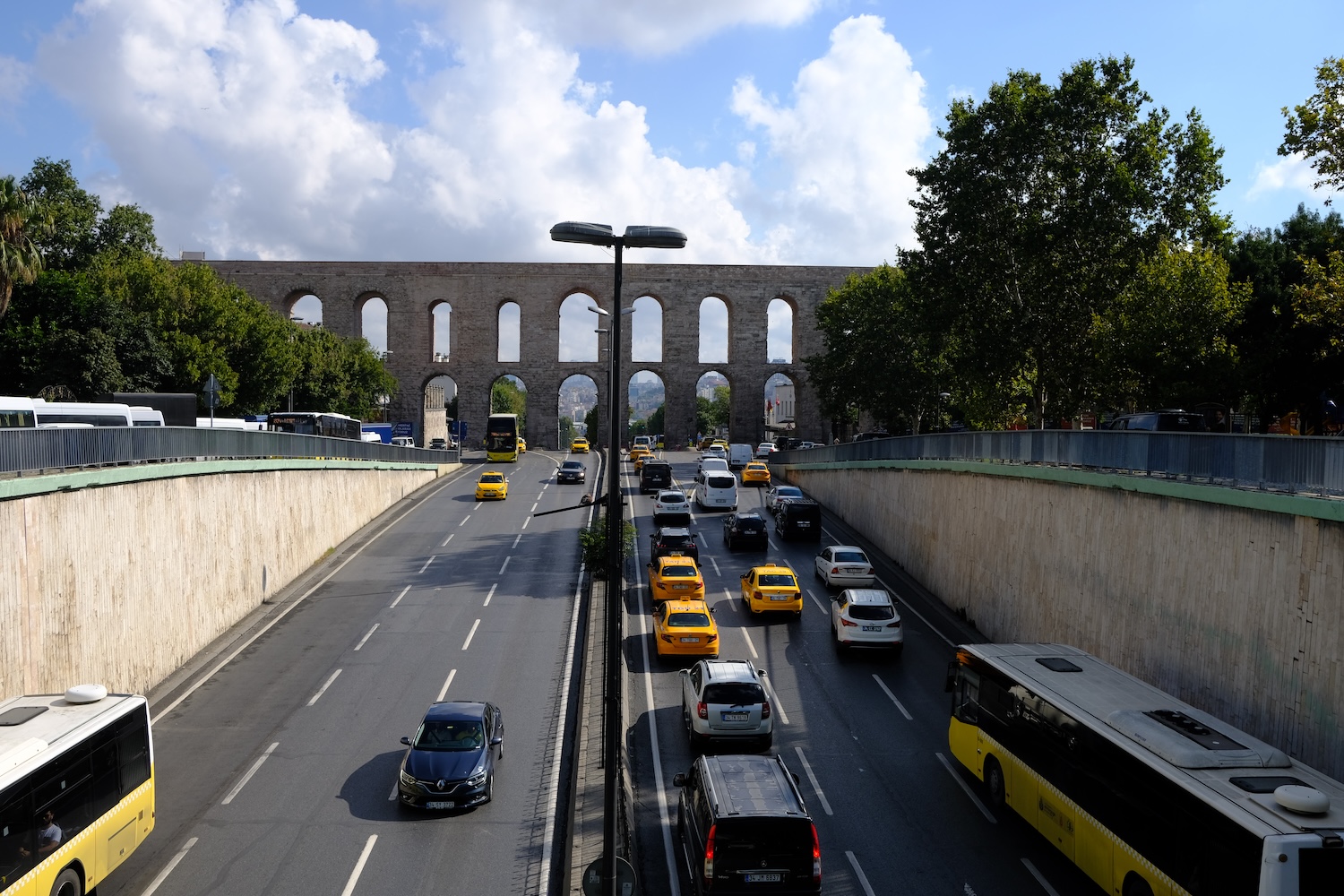 The majestic Roman aqueduct of Valente, integrated into the city traffic.