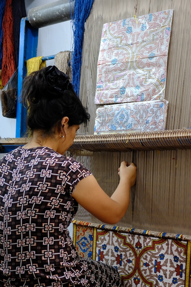 The art of silk carpet weaving in Khiva.